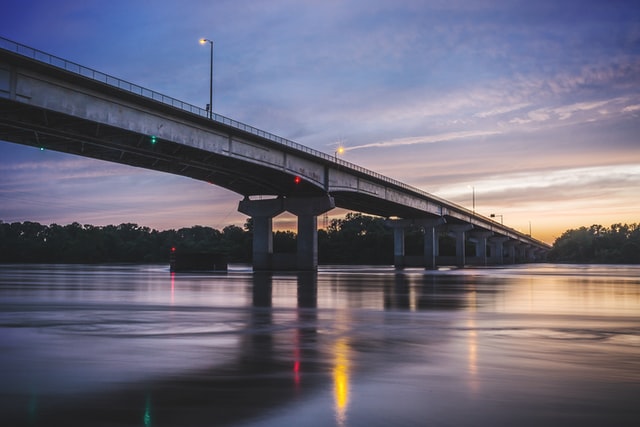 fun things to do in Fort Smith Arkansas, - this is a photo of a bridge in Fort Smith at sunset