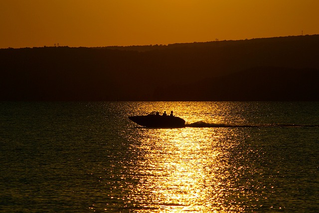 boat in sunset on Dardanelle Lake Arkansas